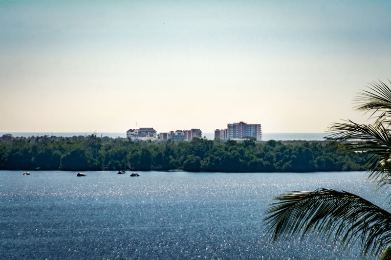 Vivo Resorts seen from Las Negras, Manialtepc Lagoon.