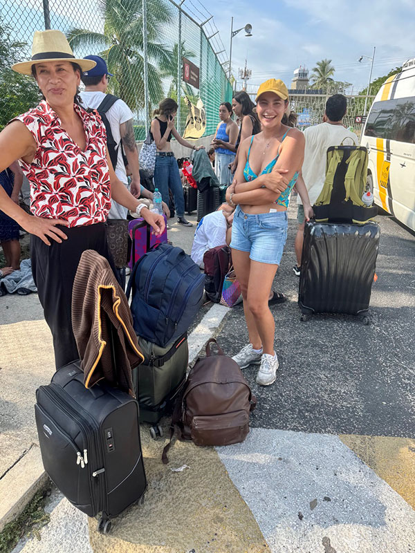 Tourists waited outside the airport entrance on Tuesday afternoon,
not knowing that all flights had been cancelled.